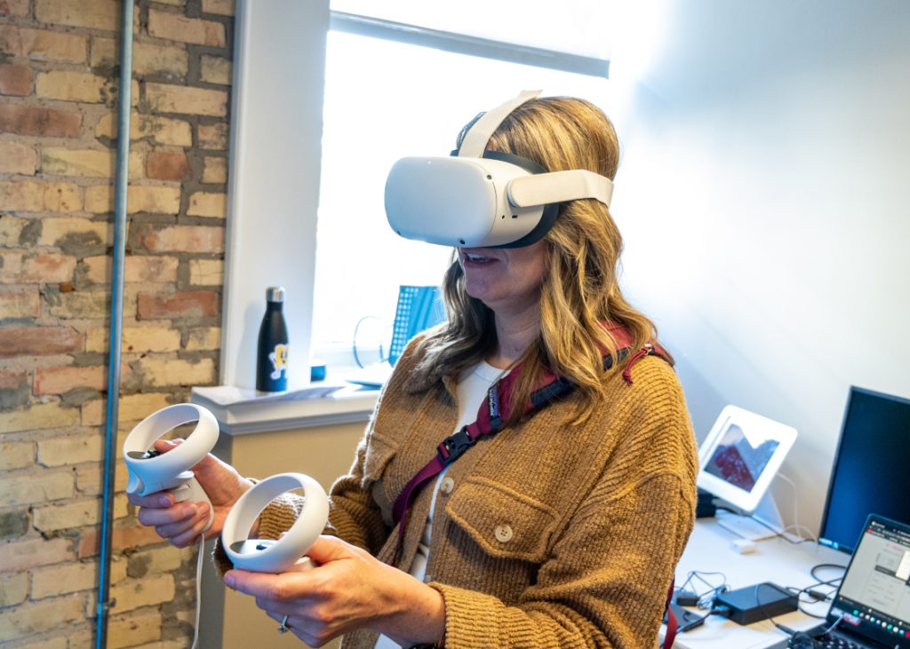 Woman using virtual reality equipment